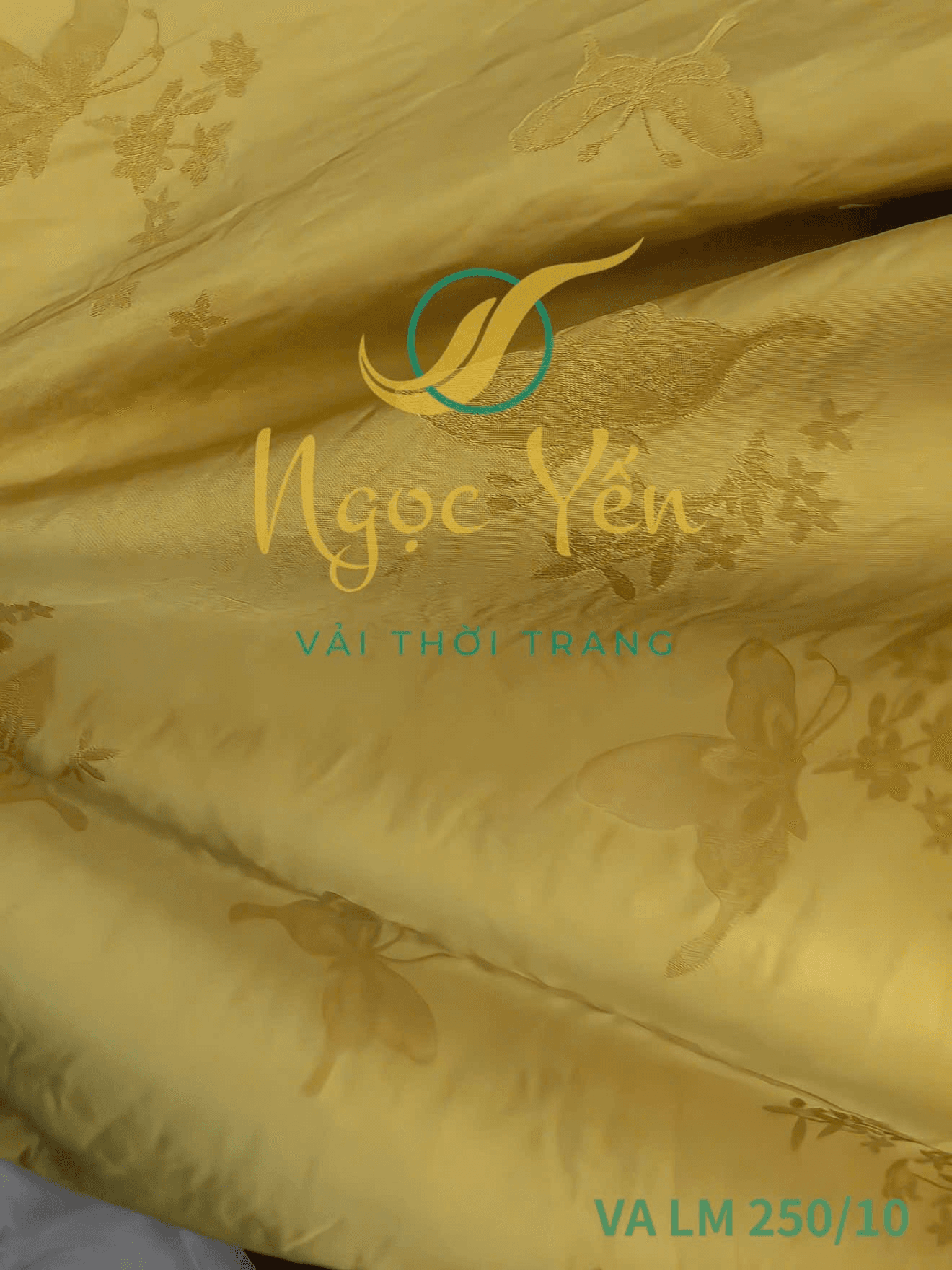 VA LM 250/10 - Vải áo dài lụa gấm in họa tiết màu vàng nhạt